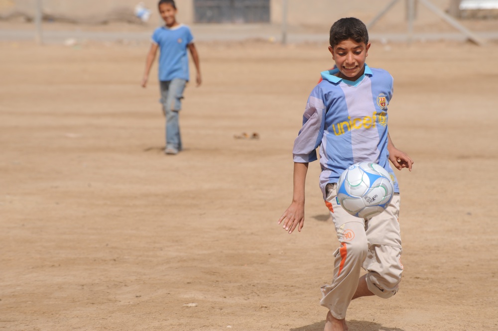 Assessing soccer fields in Baghdad