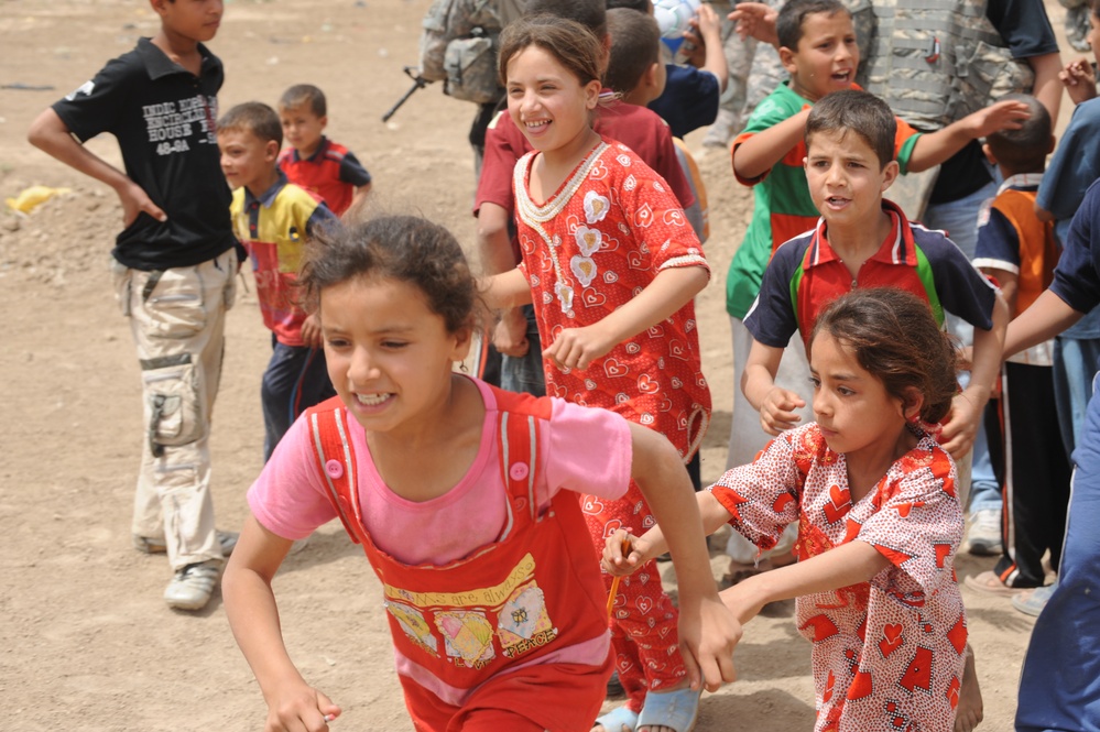 Assessing soccer fields in Baghdad