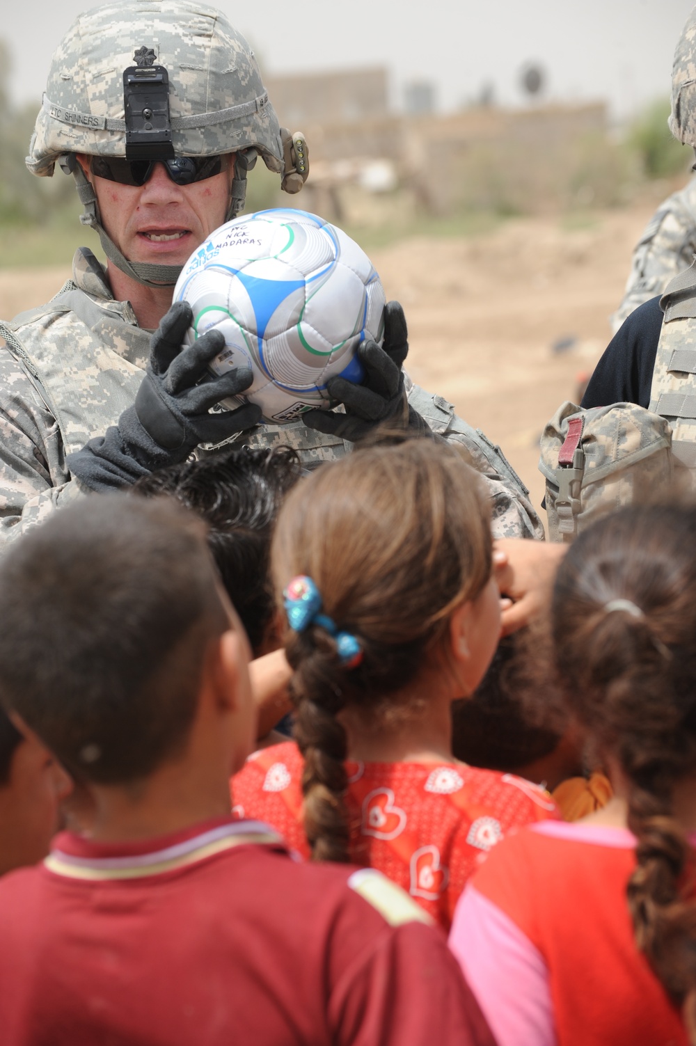 Assessing soccer fields in Baghdad