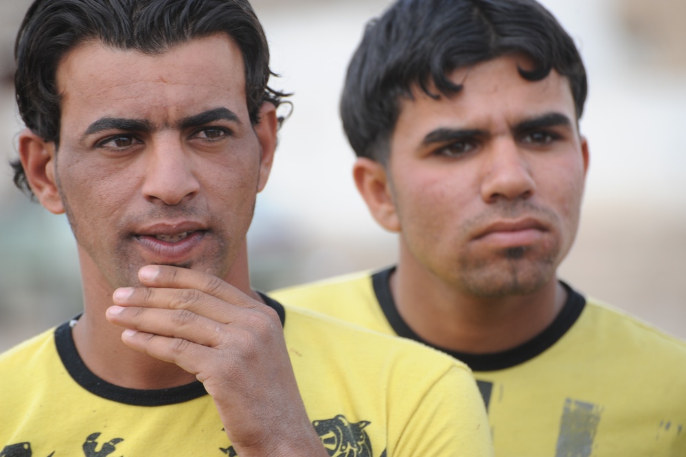 Assessing soccer fields in Baghdad