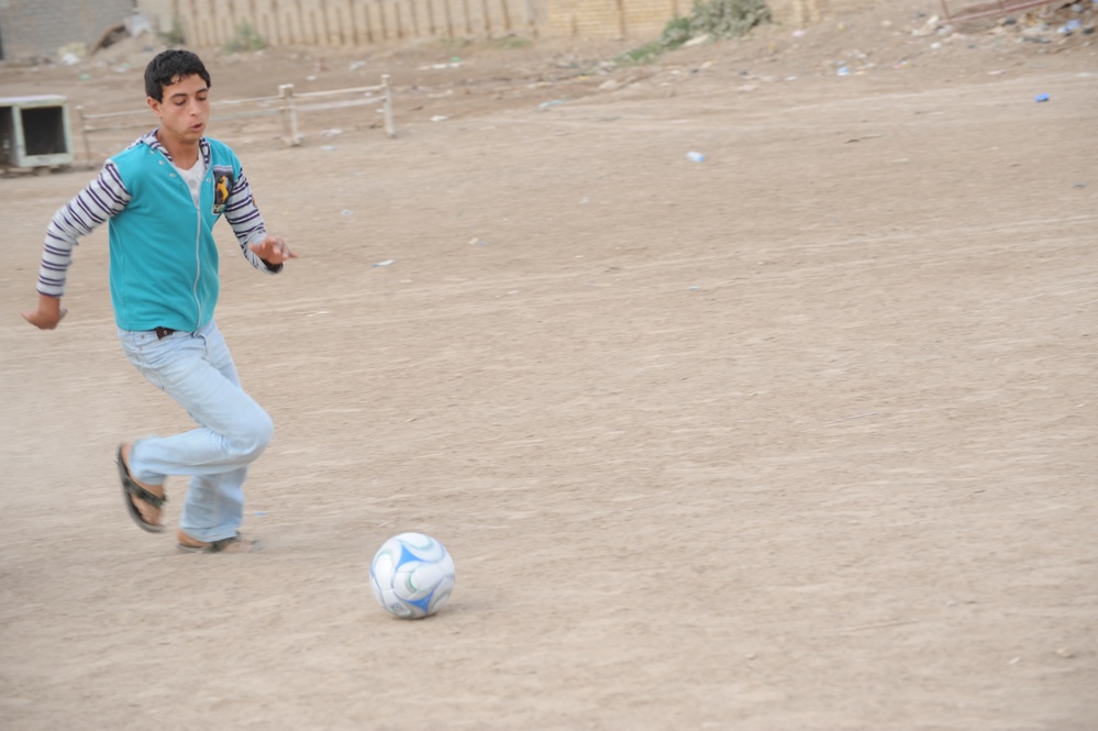 Assessing soccer fields in Baghdad