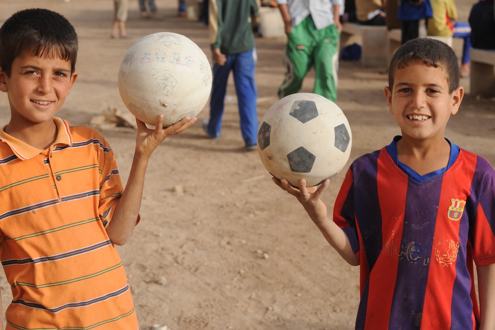 Assessing soccer fields in Baghdad