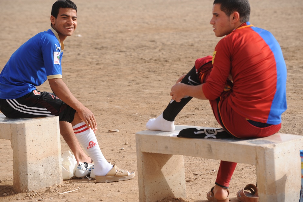 Assessing soccer fields in Baghdad