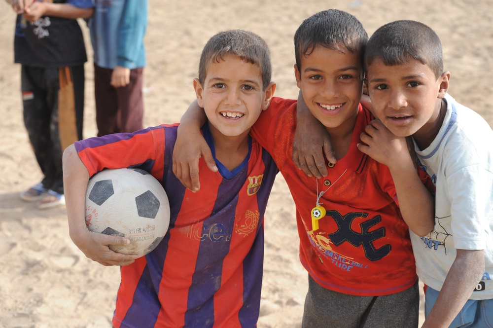 Assessing soccer fields in Baghdad