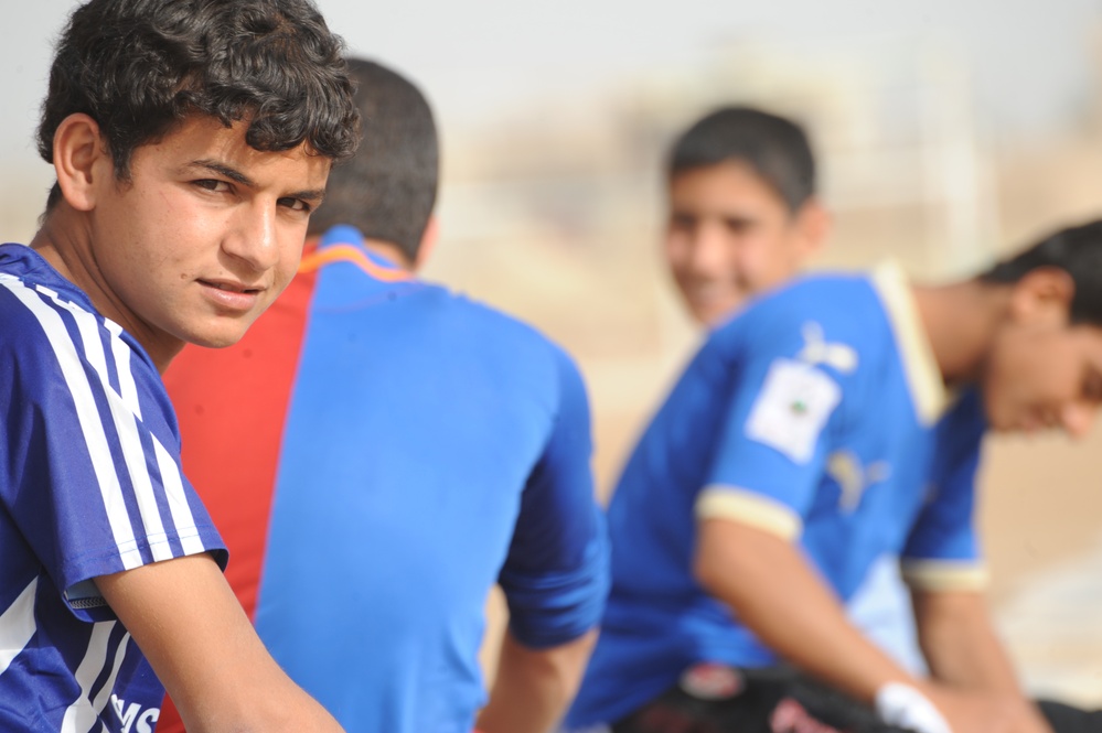 Assessing soccer fields in Baghdad