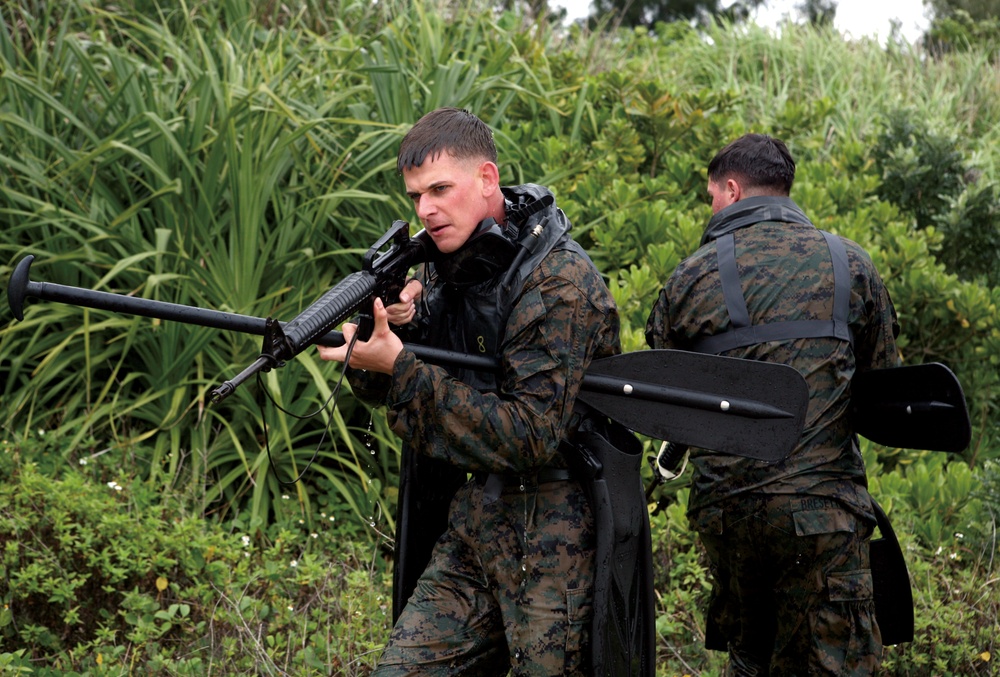 Soldiers of sea on Okinawa apply World War II lessons to survey beach for amphibious landing