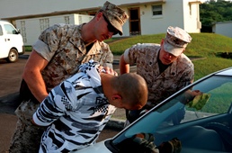 Provost Marshal's Office Marines on Okinawa tackle mean streets of vacant housing