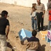 Tropic Lightning Security Detachment donates books to local Tikrit schools