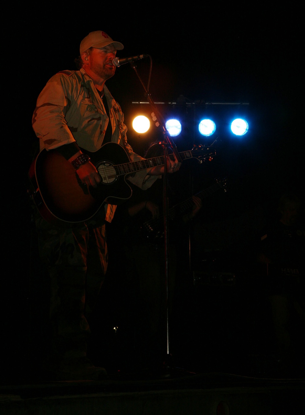 Country music star Toby Keith performs for Marines in southern Afghanistan