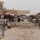 U.S., Iraqi forces patrol through Dora in Baghdad
