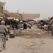 U.S., Iraqi forces patrol through Dora in Baghdad