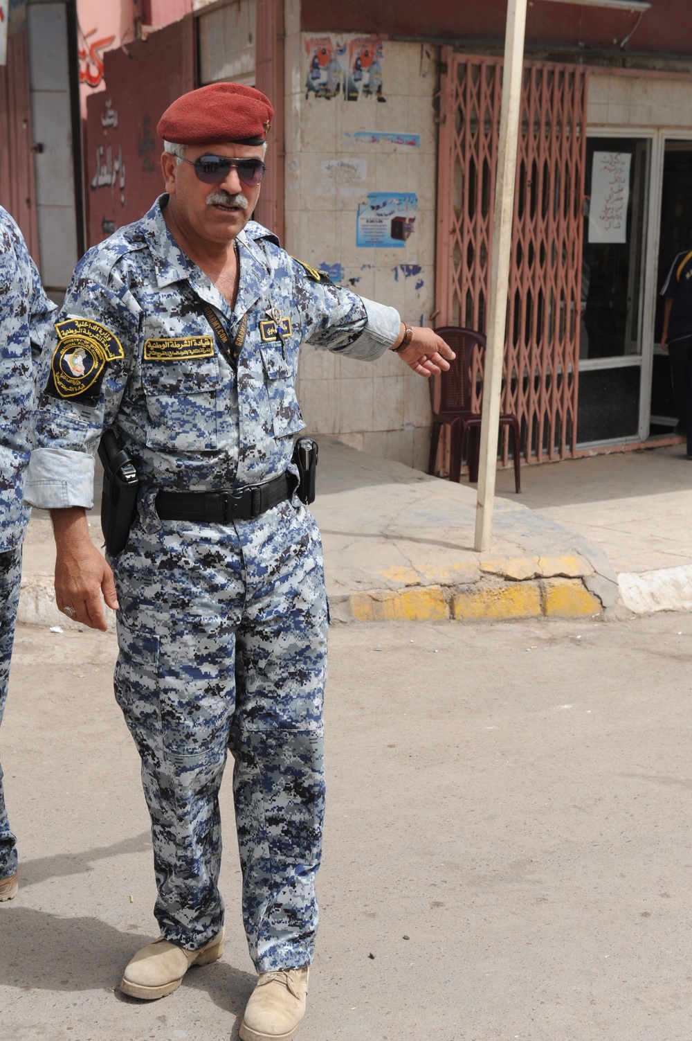 U.S., Iraqi forces patrol through Dora in Baghdad