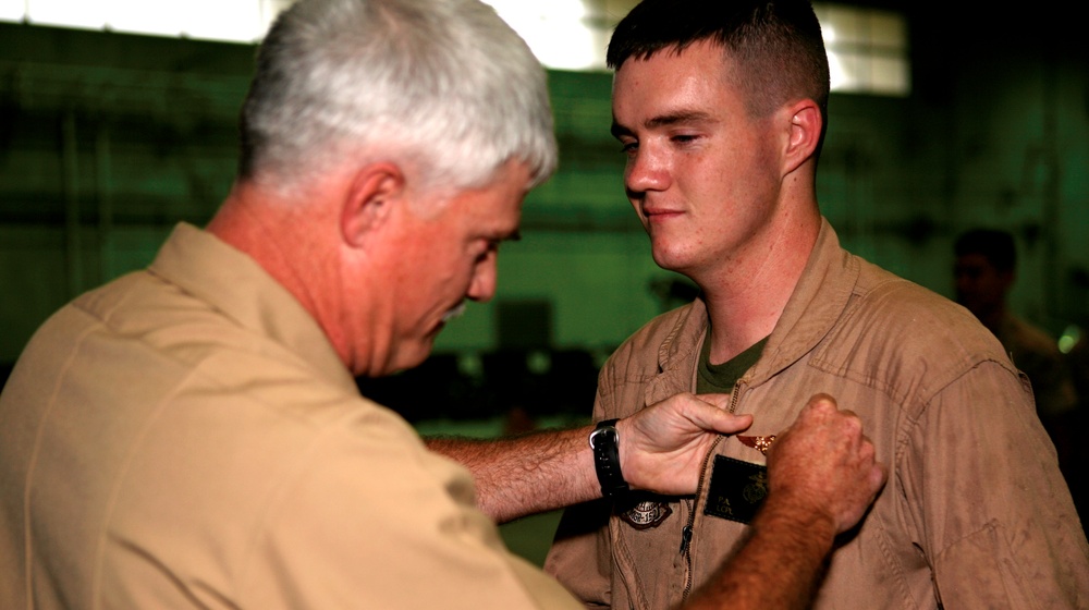 Father passes aircrew wings to Okinawa Marine marking decades of family service