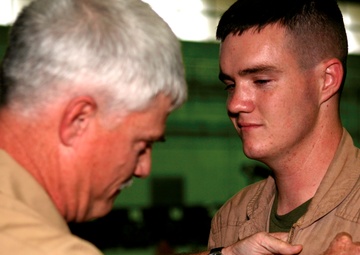 Father passes aircrew wings to Okinawa Marine marking decades of family service