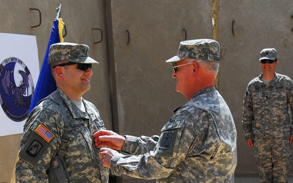 Capt. Torgerson Promoted by Lt. Gen. Vaughn