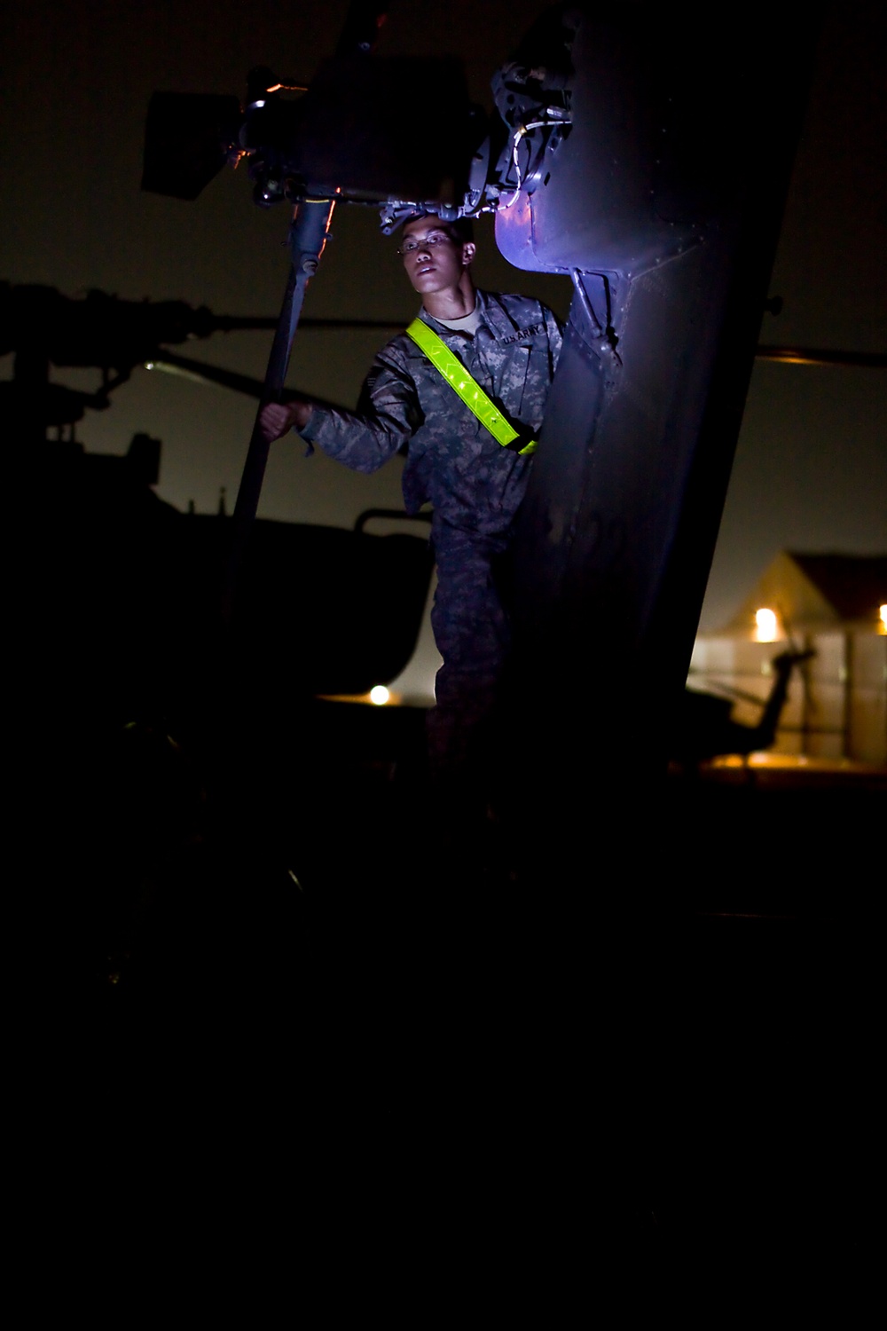 1st Air Cavalry crew chiefs work throughout the night