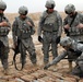 U.S., Iraqi Army Explosive Ordnance Disposal Detonate Weapons Cache in Basra
