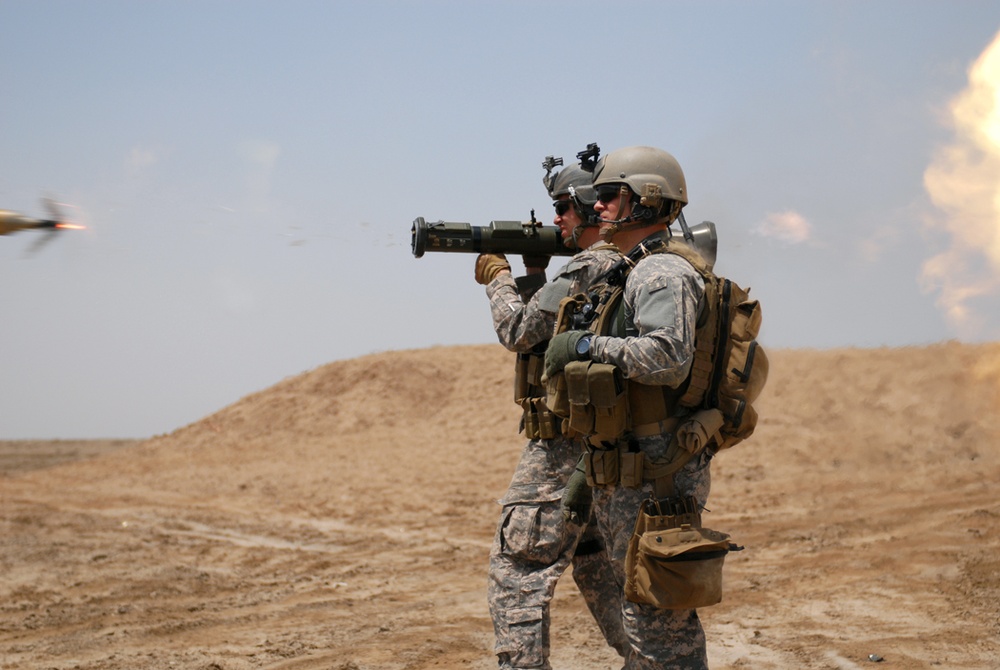 U.S. Special Forces Soldiers fire rockets