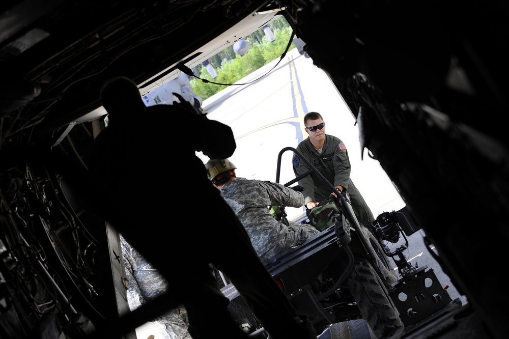 Joint Training Loading All Terrain Vehicles on a CV-22 Osprey