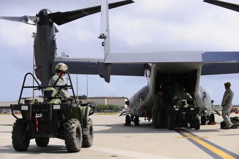 Joint Training Loading All Terrain Vehicles on a CV-22 Osprey