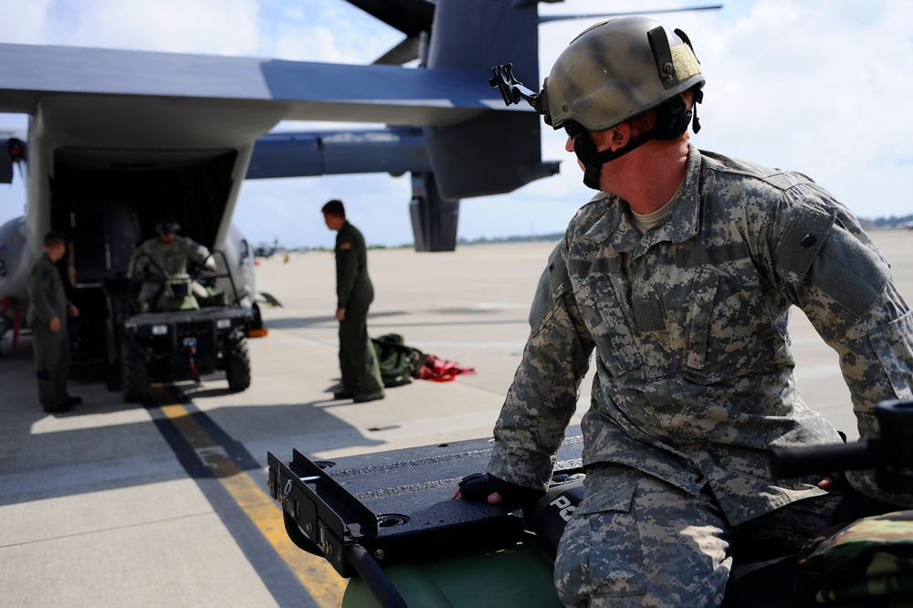 Joint Training Loading All Terrain Vehicles on a CV-22 Osprey