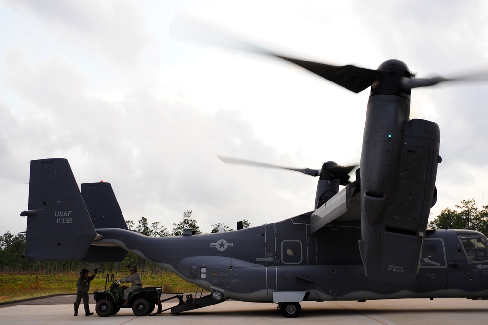 Joint Training Loading All Terrain Vehicles on a CV-22 Osprey