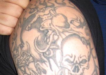 Face of Defense: Tattoos Tell Story of Soldier's Loyalties, Losses, Dreams