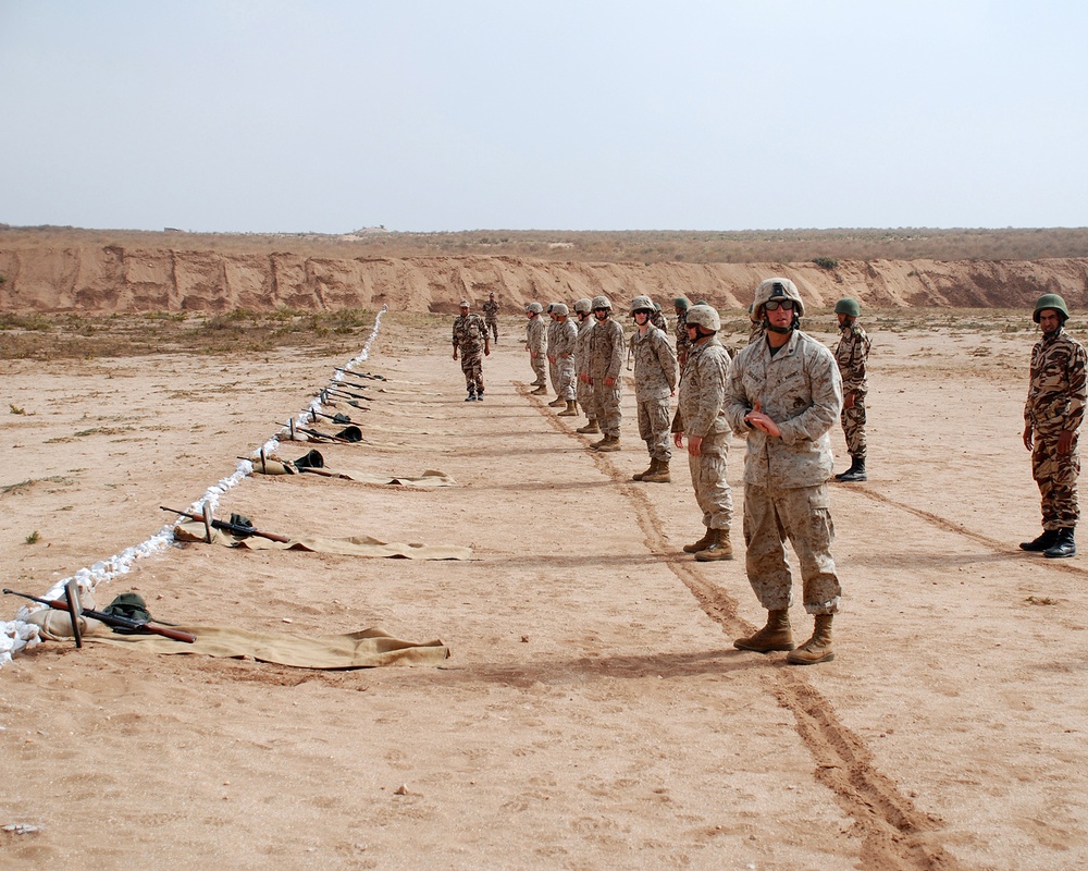 Marine policemen coduct live fire exercise