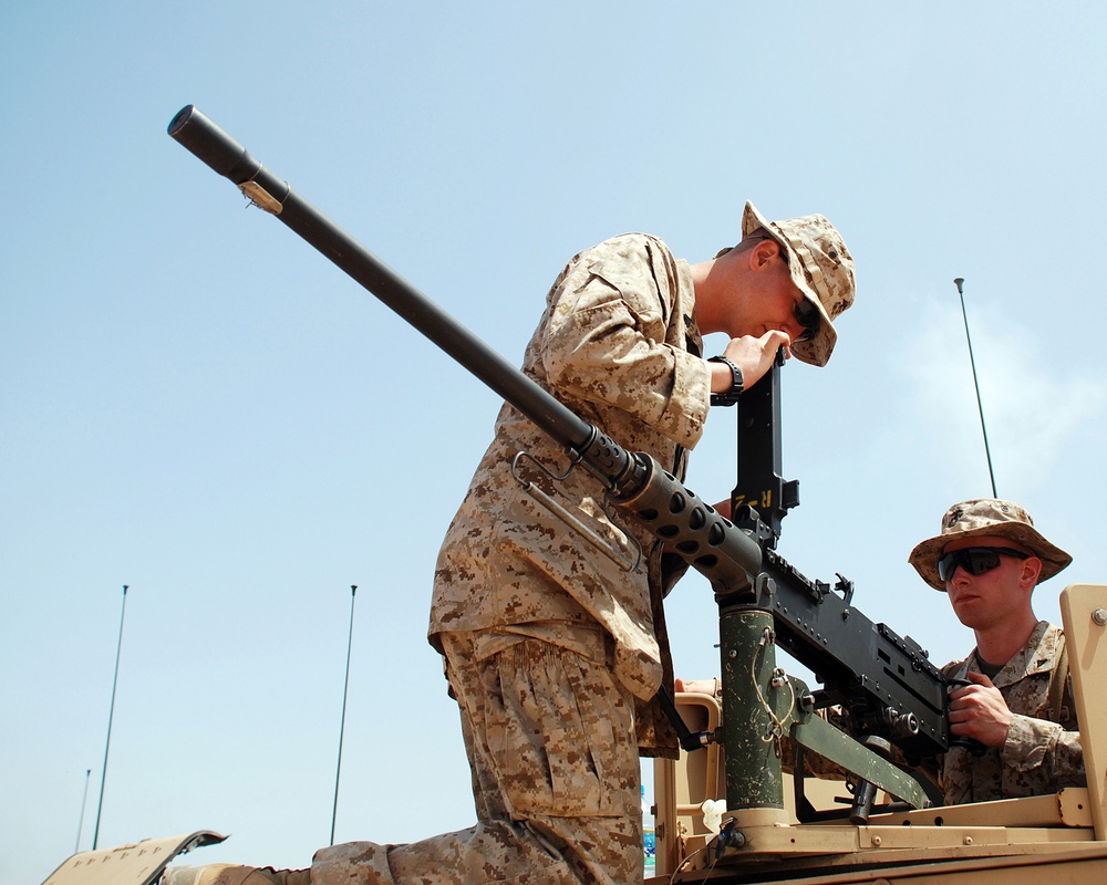 Marine policemen coduct live fire exercise