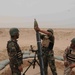 Paratroopers, Iraqis hang rounds