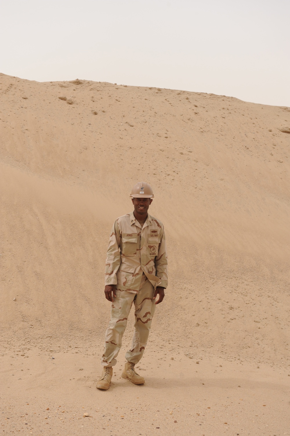 Young Navy Seabee's Get Vital On The Job Training From Mentors And On Old Dozer