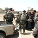 Stallion Soldiers, Iraqi security forces deliver aid to outlying village