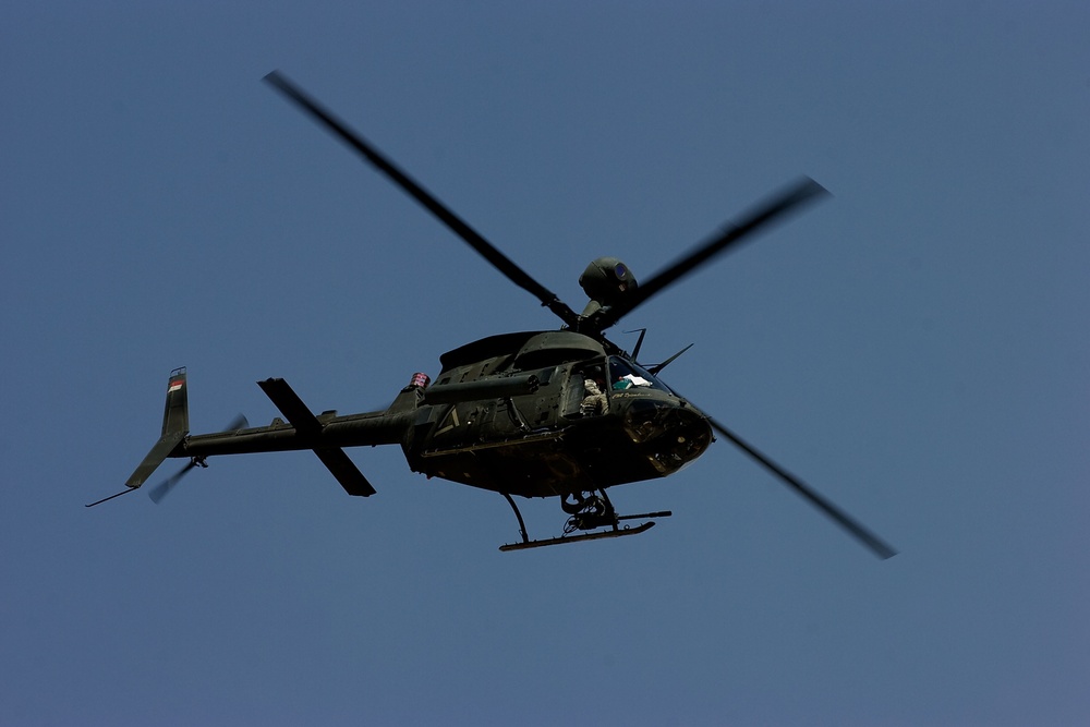 Cavalrymen, Iraqi police patrol Taza
