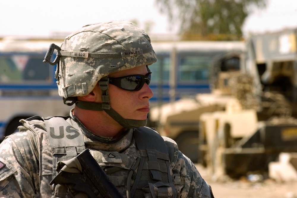 Cavalrymen, Iraqi police patrol Taza