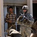 Cavalrymen, Iraqi police patrol Taza
