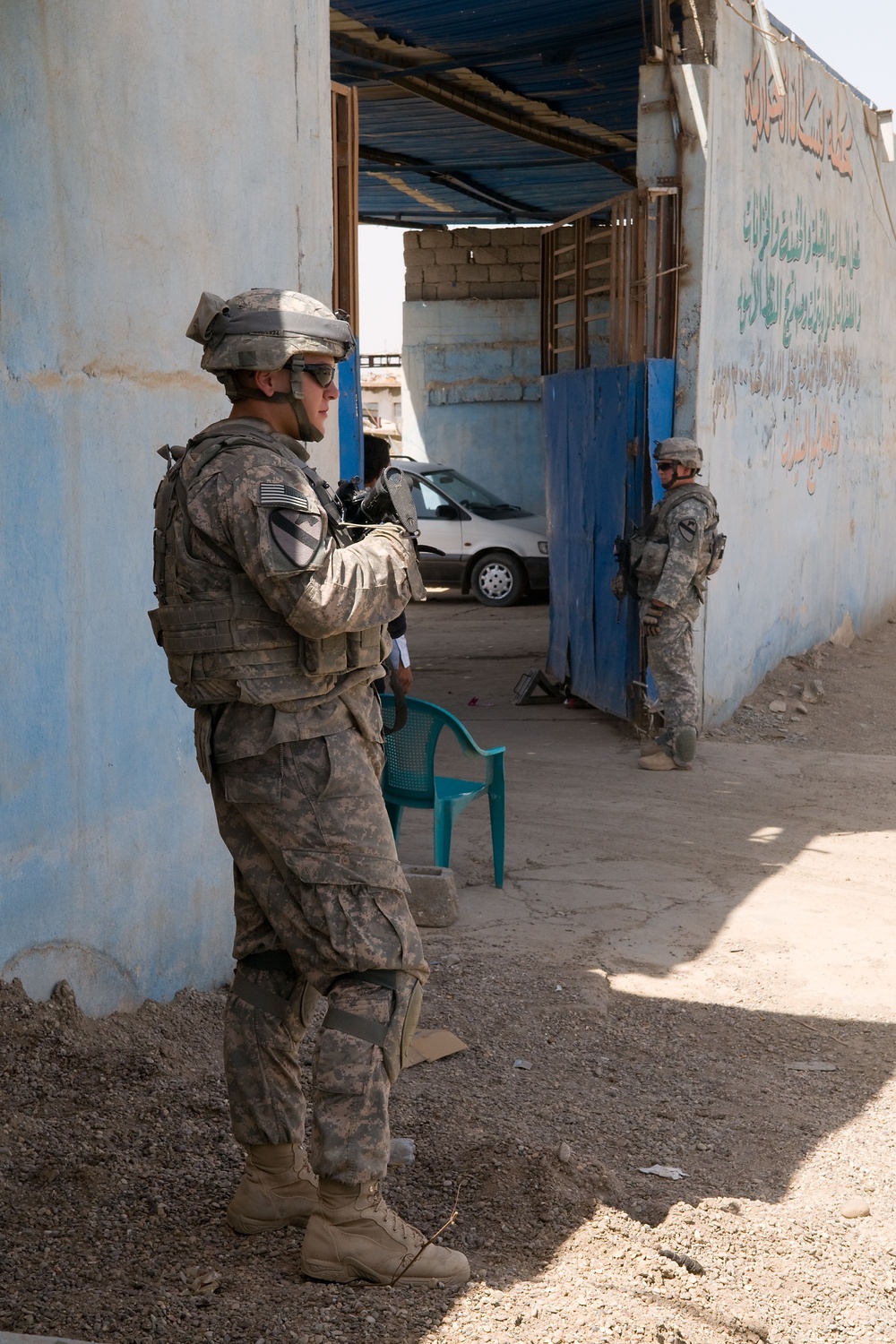Cavalrymen, Iraqi police patrol Taza
