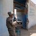 Cavalrymen, Iraqi police patrol Taza