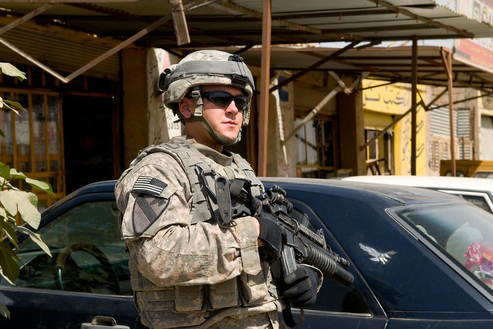 Cavalrymen, Iraqi police patrol Taza