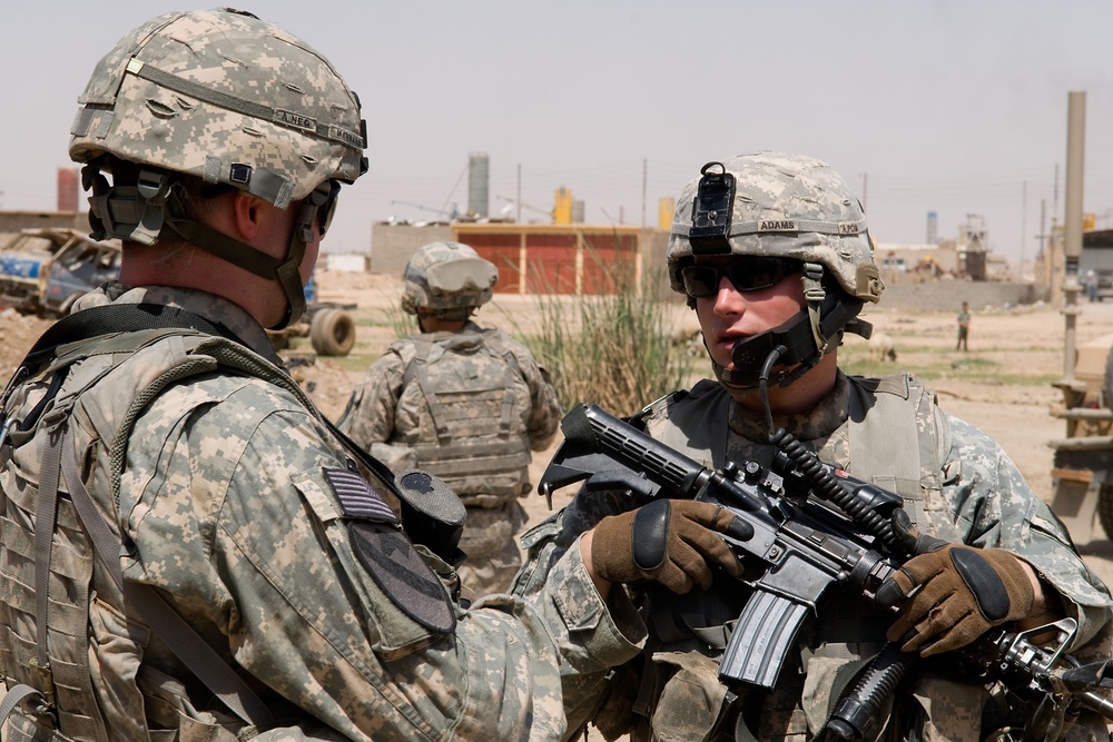 Cavalrymen, Iraqi police patrol Taza