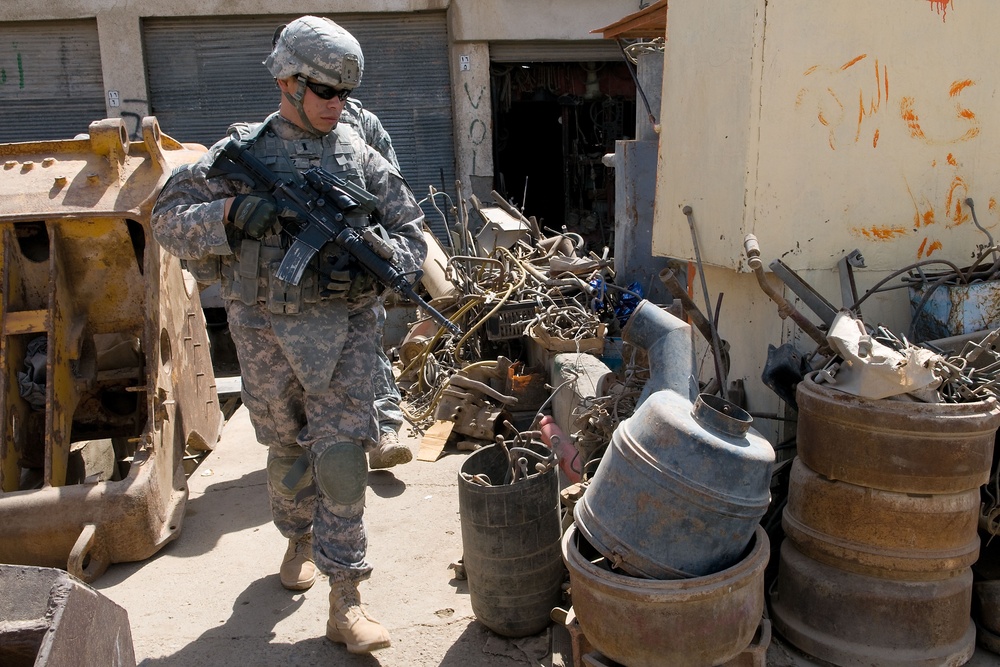 Cavalrymen, Iraqi police patrol Taza
