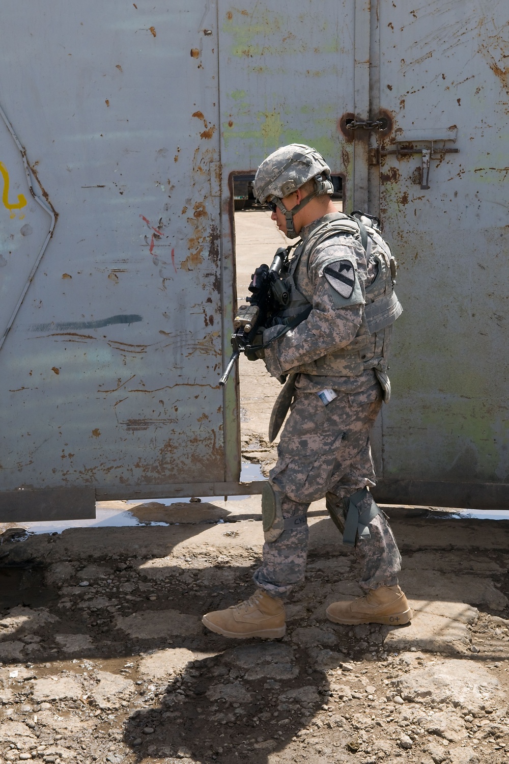 Cavalrymen, Iraqi police patrol Taza