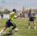 Iraqi Police, U.S. Soldiers Strengthen Bonds with Medals, Soccer