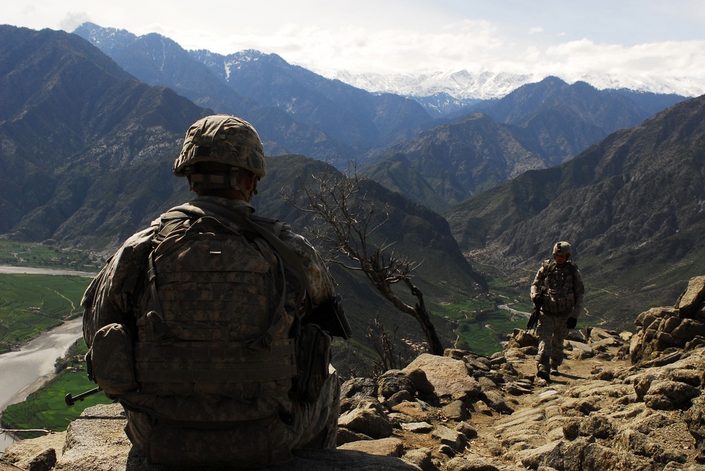 1st Infantry Division Cavalry Scouts search unexplored terrain