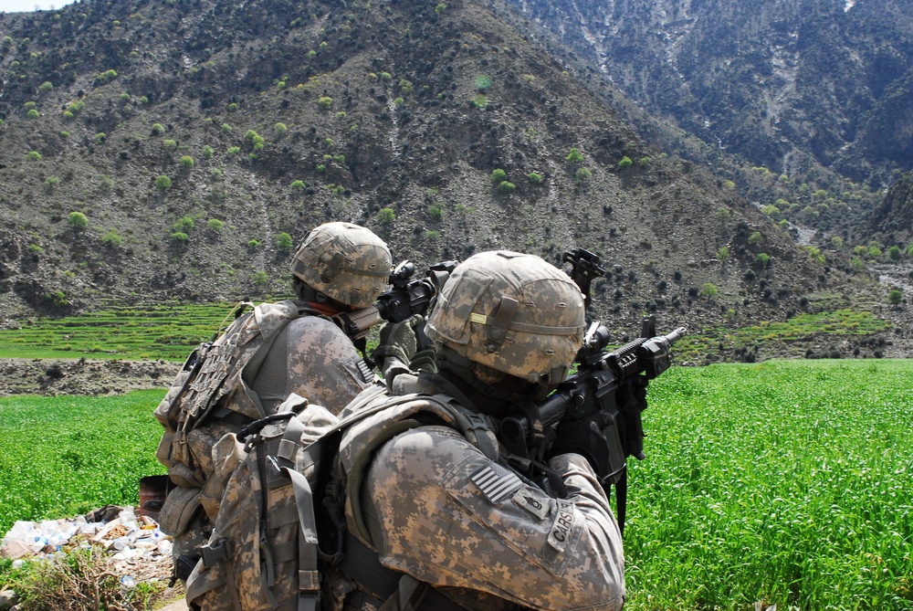 1st Infantry Division Cavalry Scouts search unexplored terrain