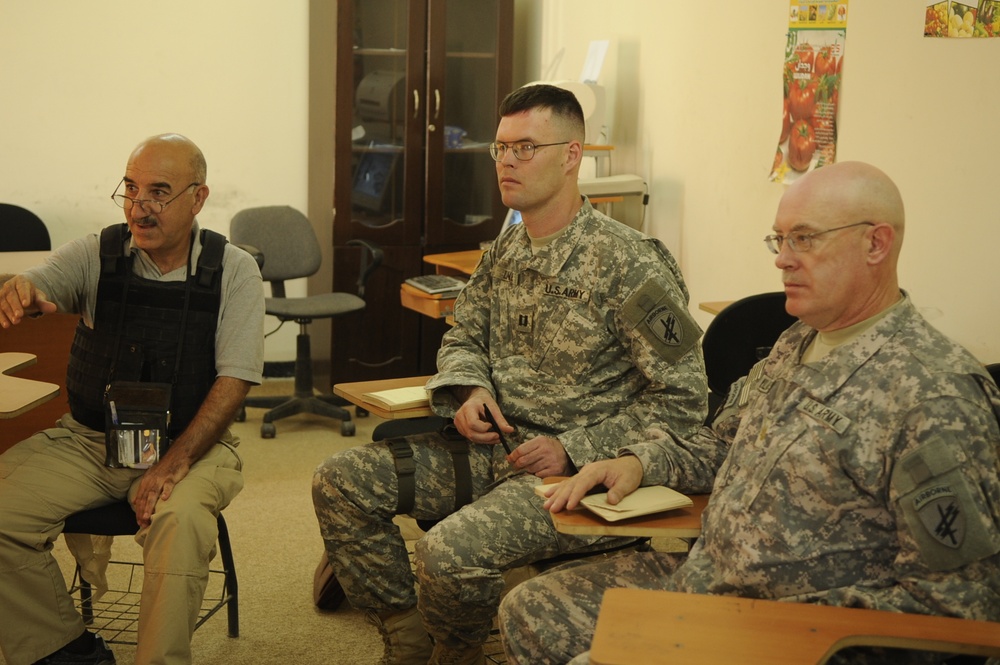 Soldiers meet with Iraqi tomato growers association Soldiers meet with Iraqi tomato growers association