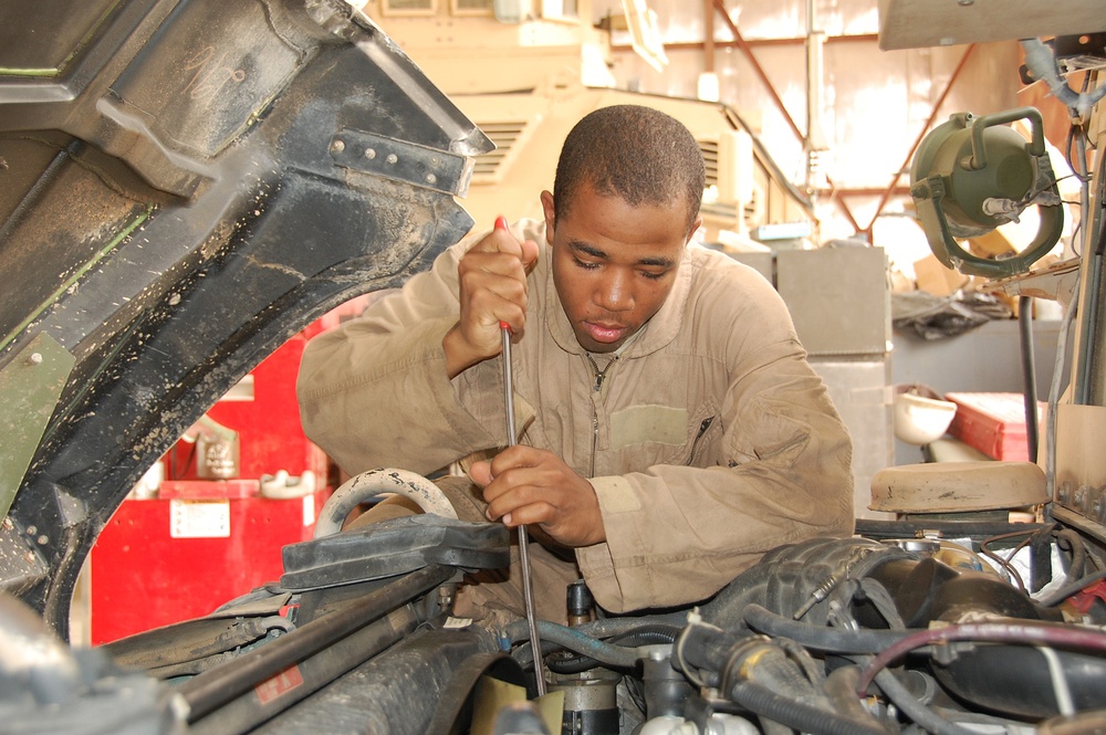 Soldiers Repair Vehicles