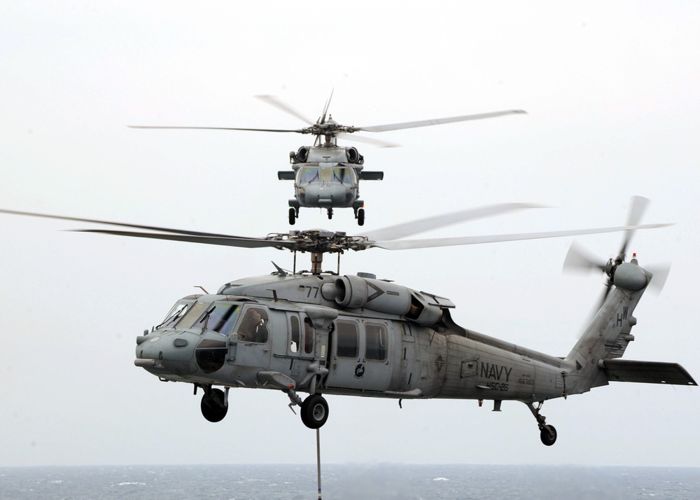 Sea Hawk Helicopters Move Supplies