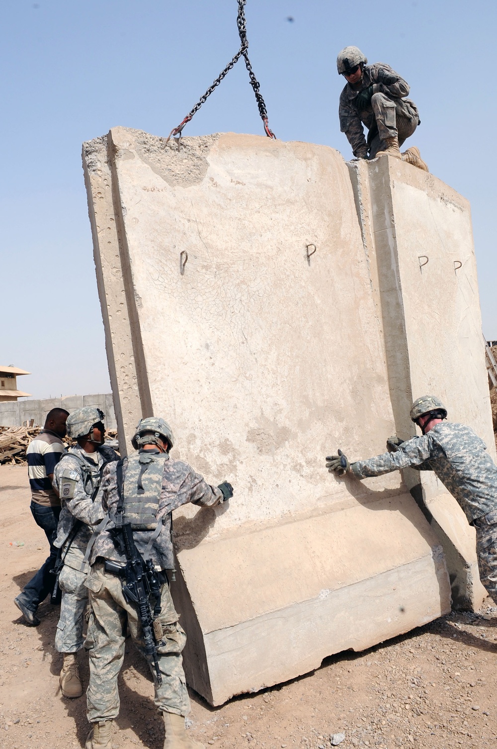 Expanding T-walls at Joint Security Station Loyalty in Baghdad, Iraq