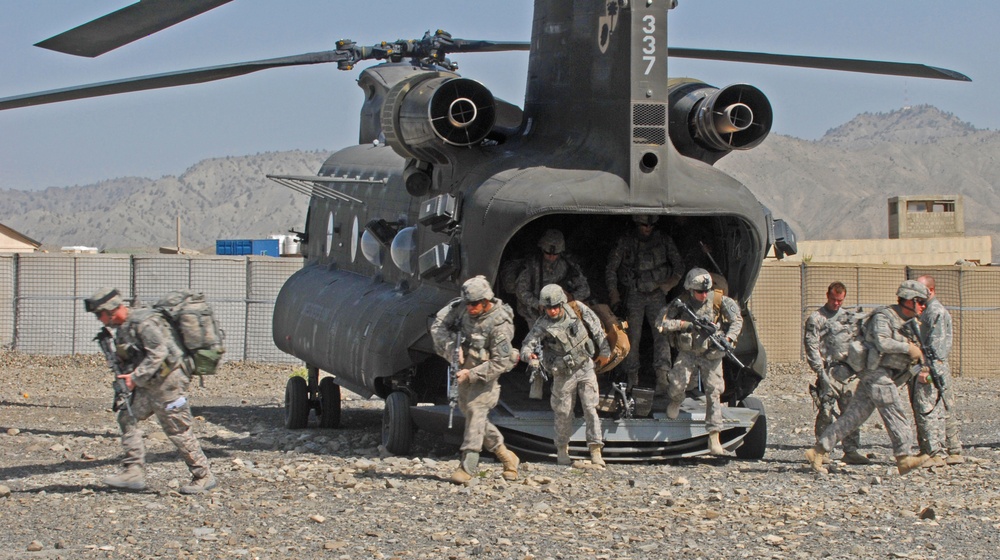 Afghan national security forces, International Security Assistance Force conduct joint operation, build relationships