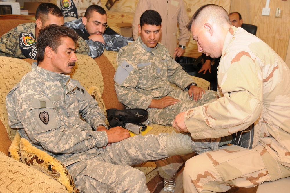 Combat Lifesaver Course given to the Iraqi Police Counter Explosive Team in Tikrit, Iraq